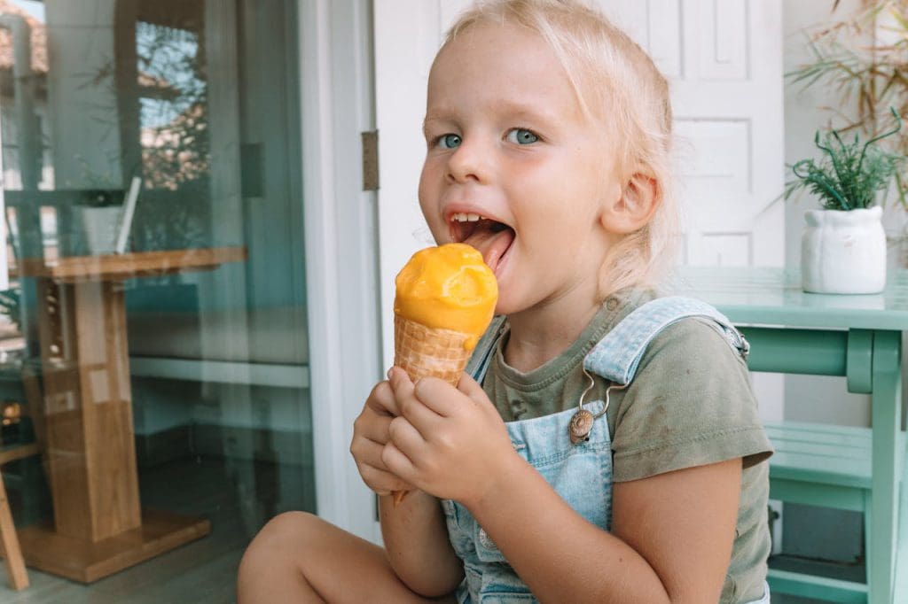 Playte - child eating ice cream -roman-odintsov